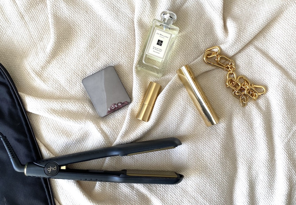 beautyitems GHD straightener for long hair along with necklace, lipstick, stick blush, eyeshadow palette and jo malone fragrance