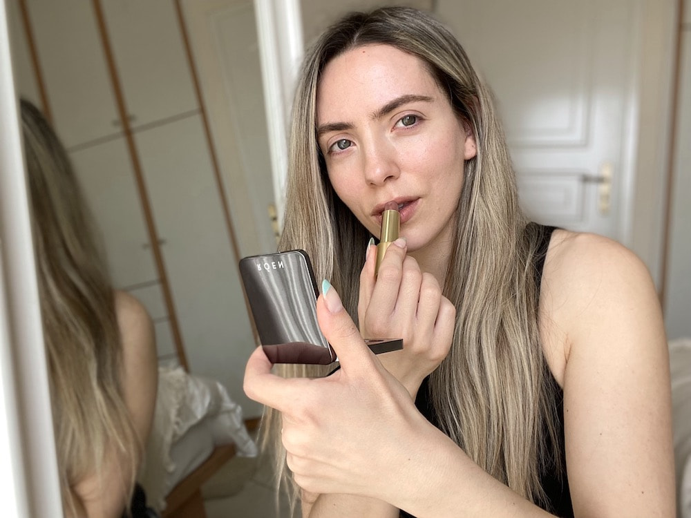 puttinglipstickon Putting lipstick on as part of getting ready